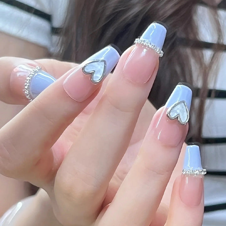 Artificial nails with romantic heart and glitter decorations Bowlift