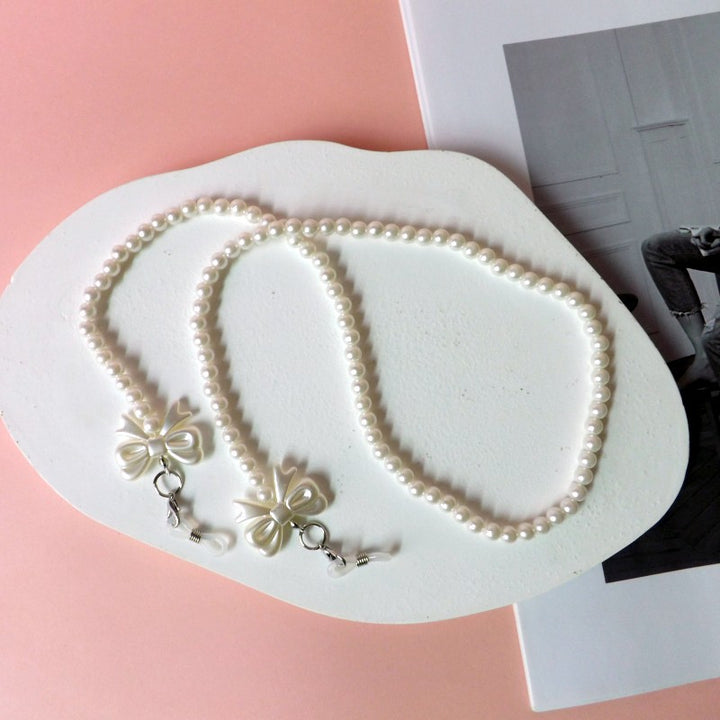 Elegant pearl glasses chain with bow pendants Bowlift