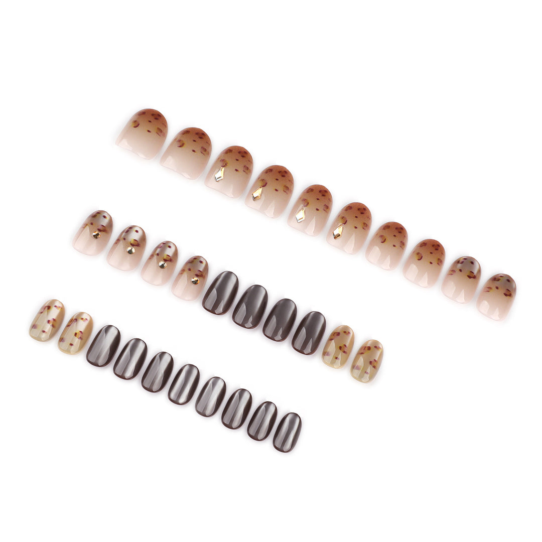 Artistic nail art with glitter accents and elegant design Bowlift