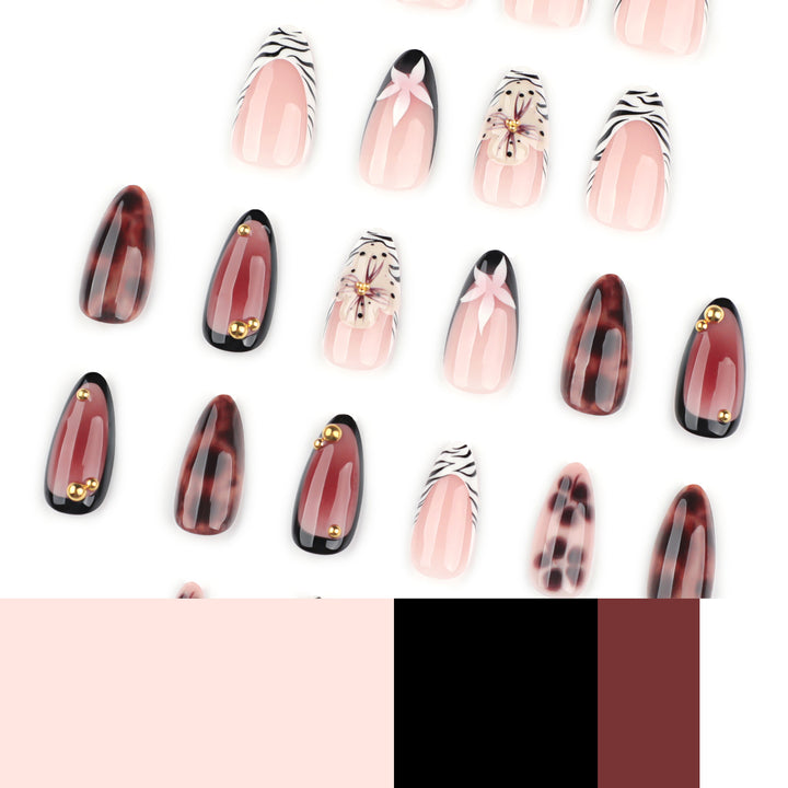 Nail Art with elegant flower design and glitter accents Bowlift