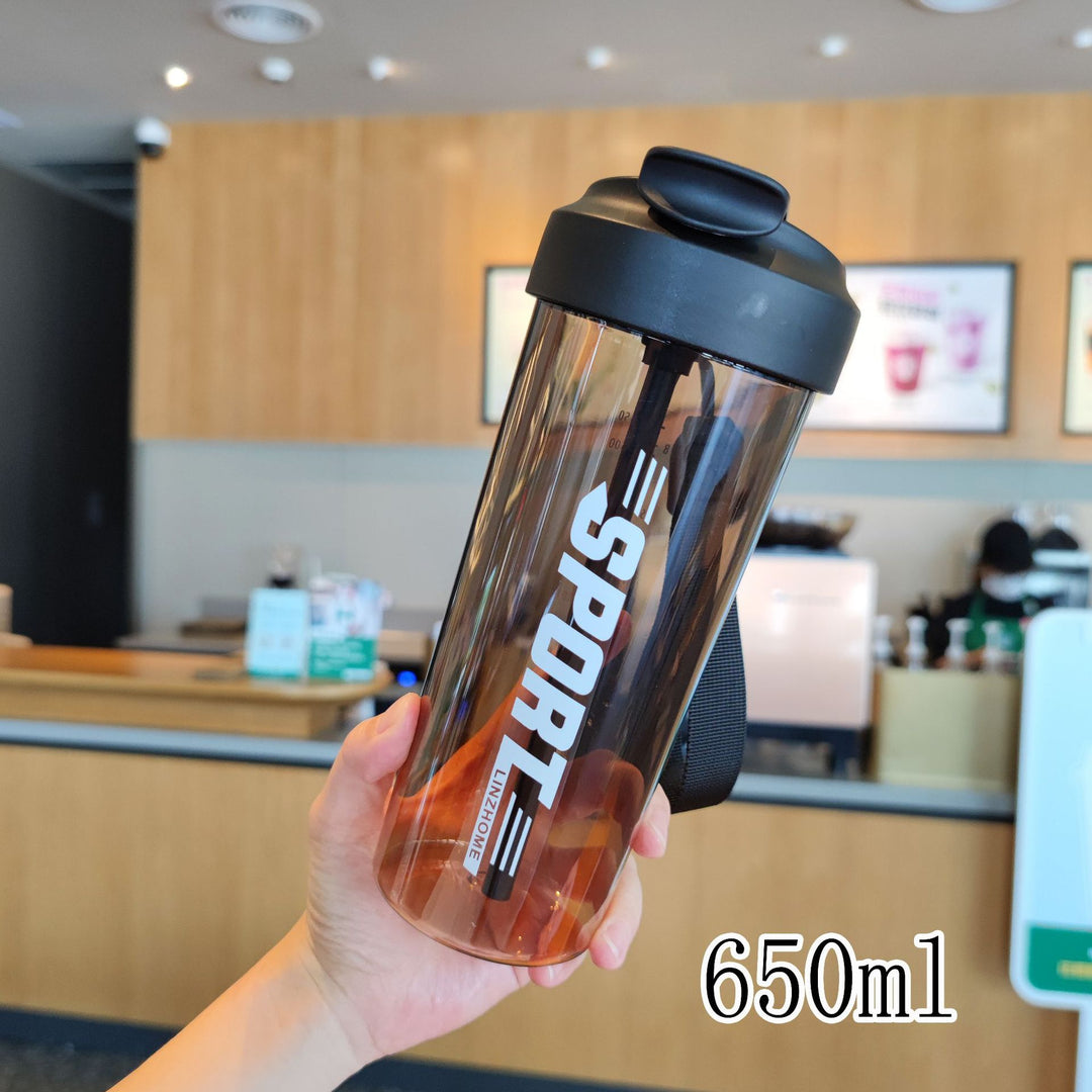 Women's sports water bottle with practical straw and carry function Bowlift