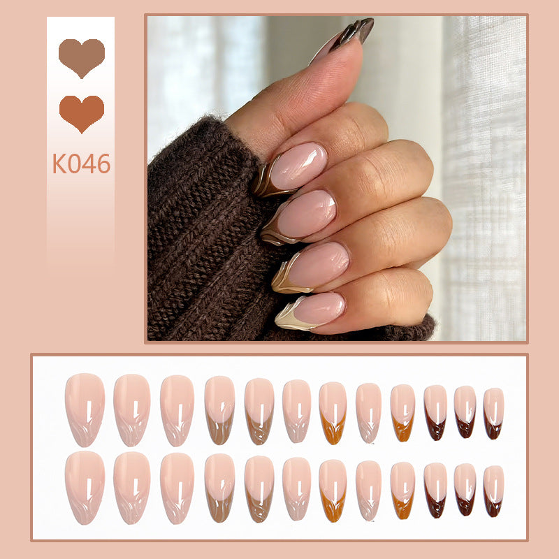 Acrylic nail set with elegant marble pattern and glossy finish Bowlift