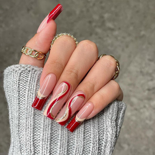Glamorous artificial nails with elegant wave pattern and glitter accents Bowlift