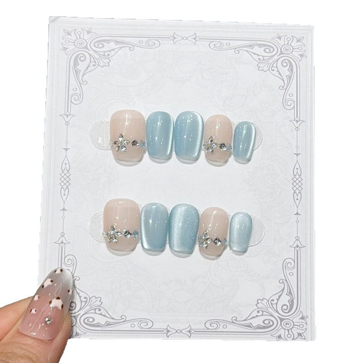Elegant Artificial Nails with Radiant Accents Bowlift