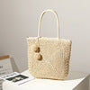 Handmade straw bag with pompom details Bowlift