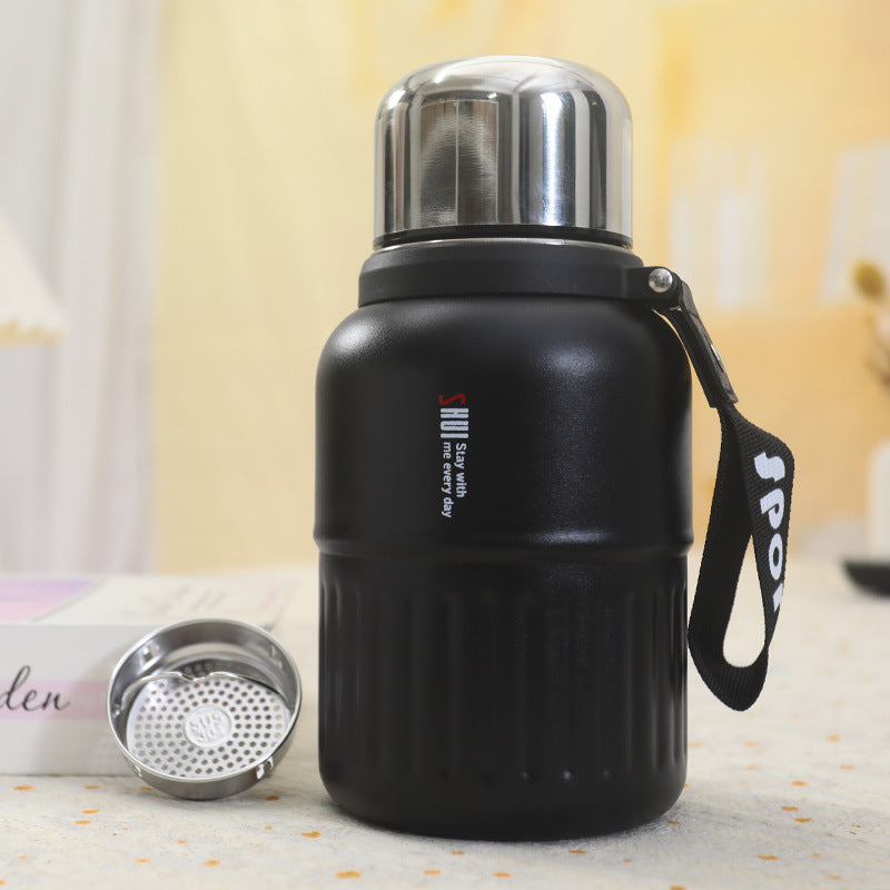 Insulated thermos bottle with practical drinking cup and sturdy carrying strap Bowlift