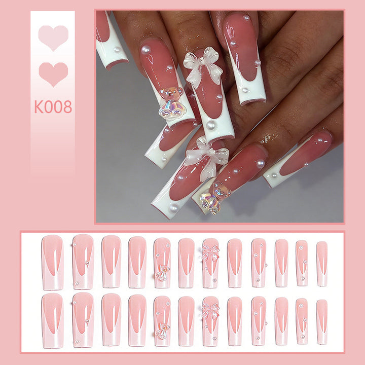 Artificial nail set with elegant bow and pearl decorations Bowlift