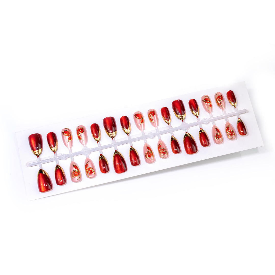 Artistic Press-On Nail Set with Floral and Metallic Accents Bowlift