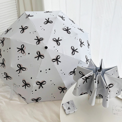 Women’s Folding Umbrella with Playful Bow Pattern Bowlift