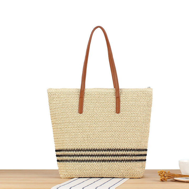 Stylish beach bag made of natural weave with leather handles Bowlift