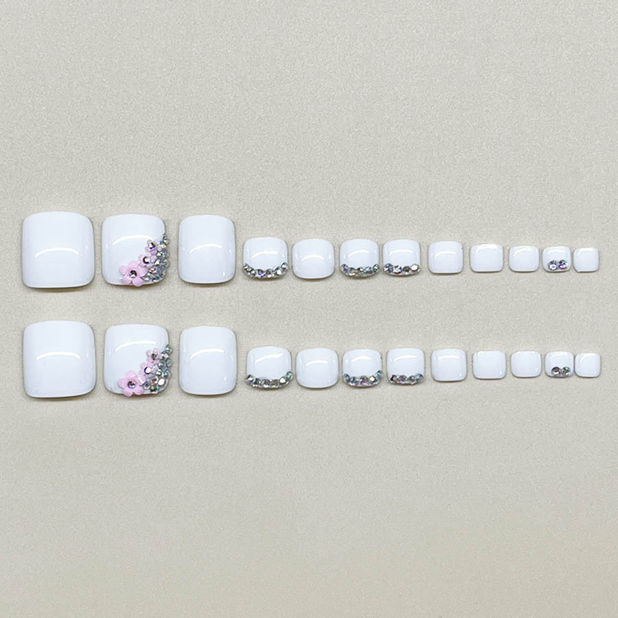 Nail art set with elegant glitter embellishments and floral accents Bowlift