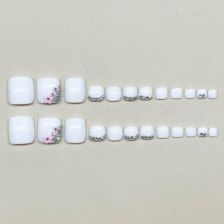 Nail art set with elegant glitter embellishments and floral accents Bowlift
