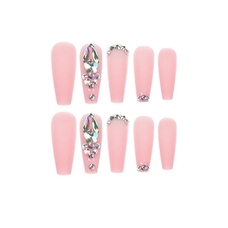 Artistic acrylic nails with glitter and rhinestone embellishments Bowlift