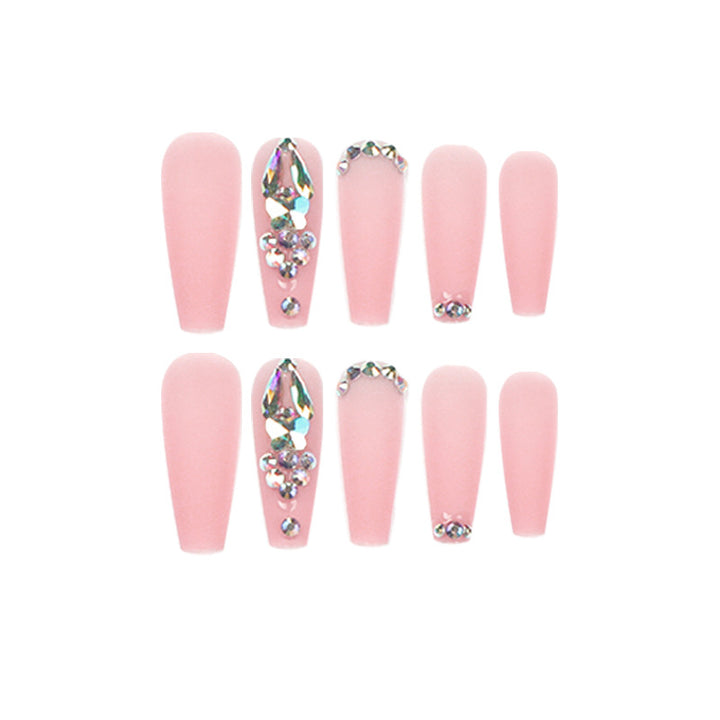 Artistic acrylic nails with glitter and rhinestone embellishments Bowlift