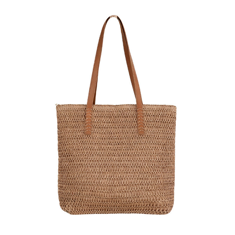 Spacious wicker tote bag with sturdy leather handles Bowlift