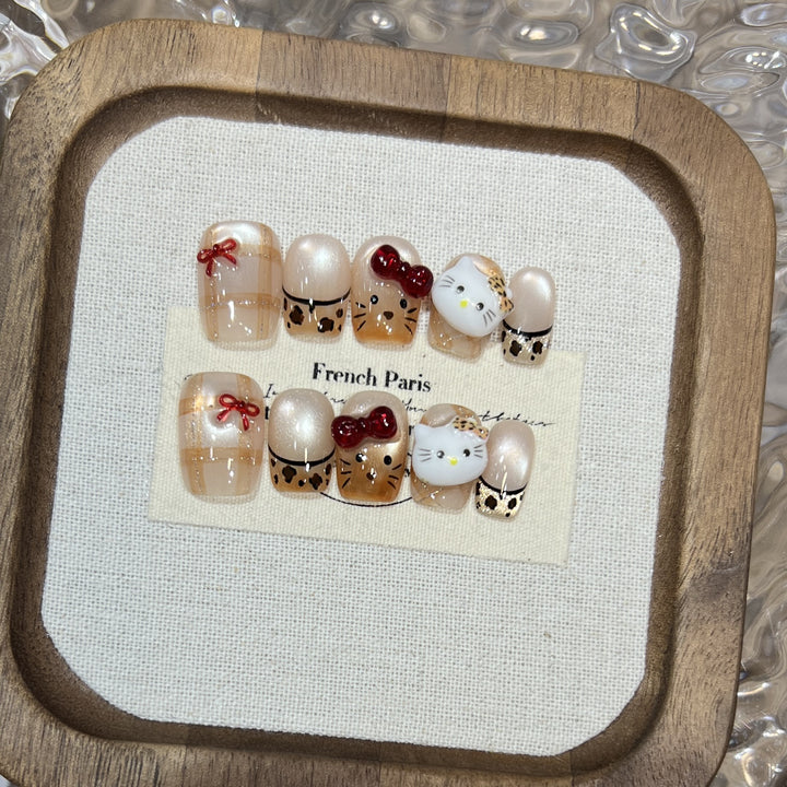 Elegant Stiletto Press-On Nail Set with Decorative Accents Bowlift