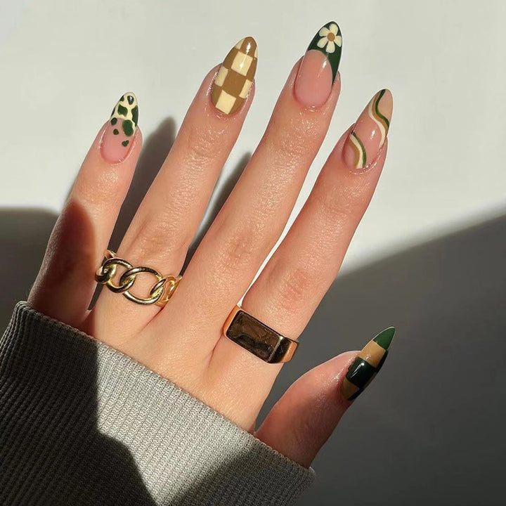 Artful nail extensions with an elegant leaf pattern Bowlift
