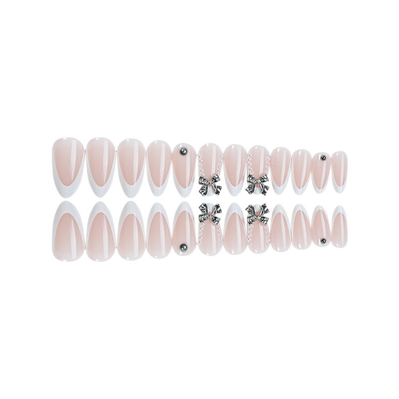 Acrylic nail set with elegant decorative embellishments Bowlift