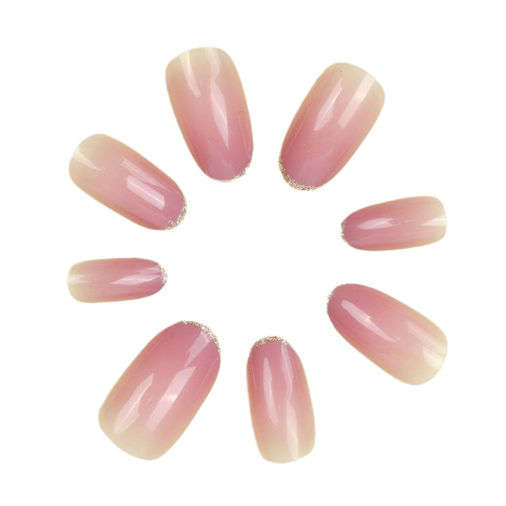 Elegant Stiletto Nail Extensions with Glittering French Tips Bowlift