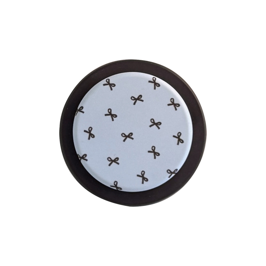 Decorative coaster with bow motif Bowlift