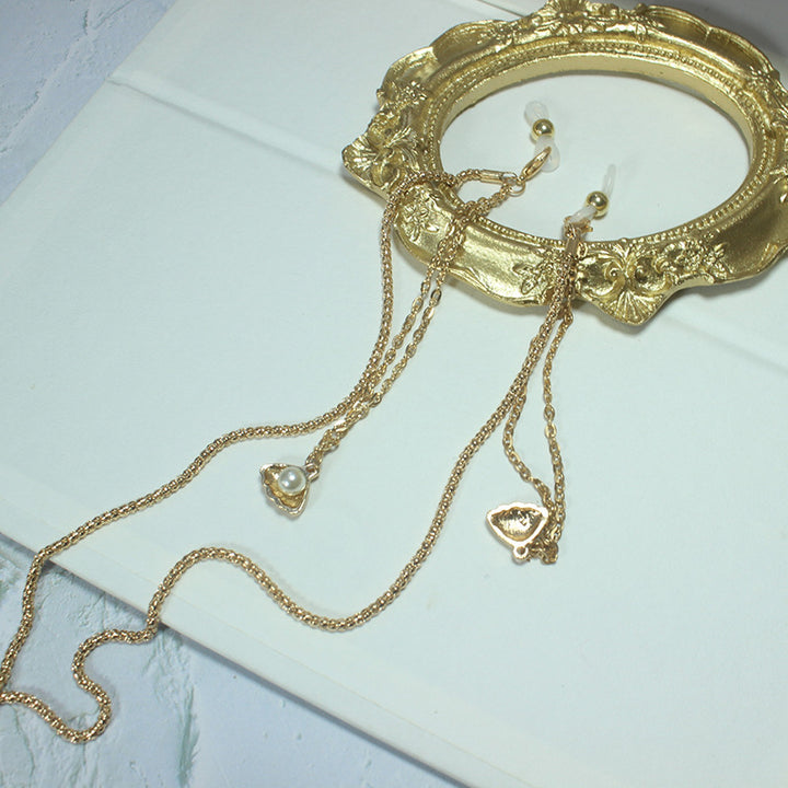 Elegant necklace with green stone and golden accents Bowlift