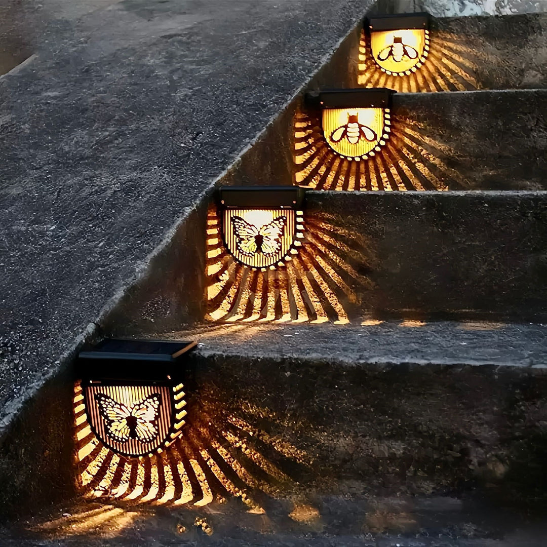Decorative Solar-Powered Outdoor Wall Lanterns With Laser-Cut Insect And Floral Panels And Warm LED Ambiance Bowlift