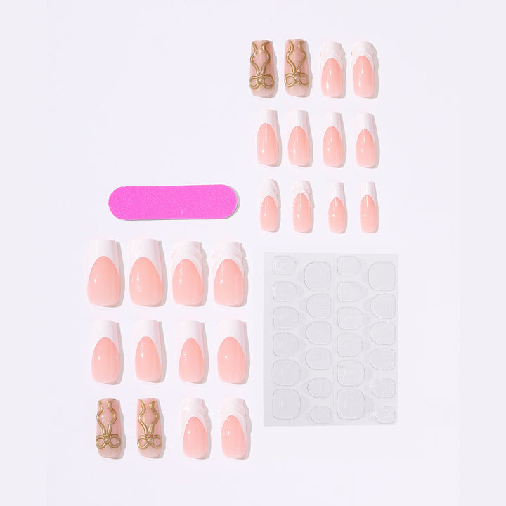 Artificial nail set with luxurious golden accents and elegant design Bowlift