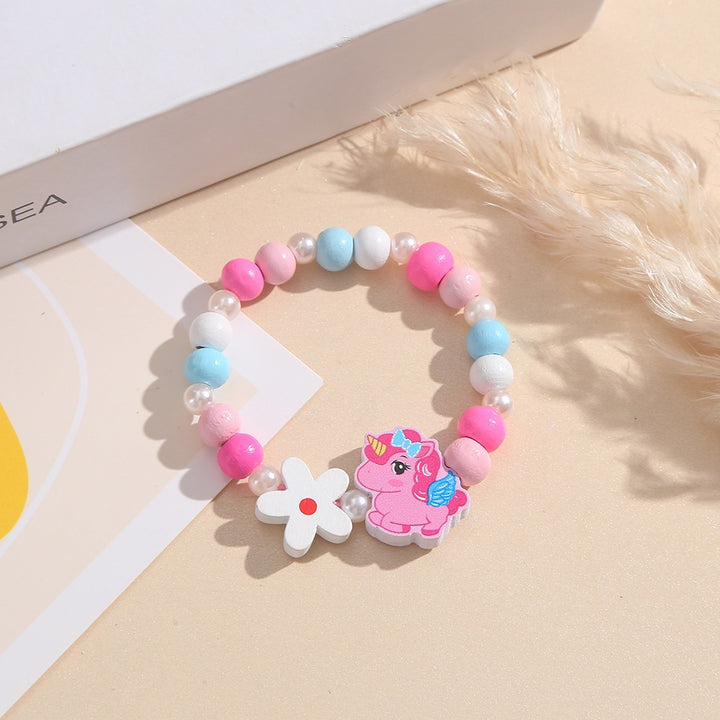 Playful children's bracelet with unicorn and flower motif Bowlift