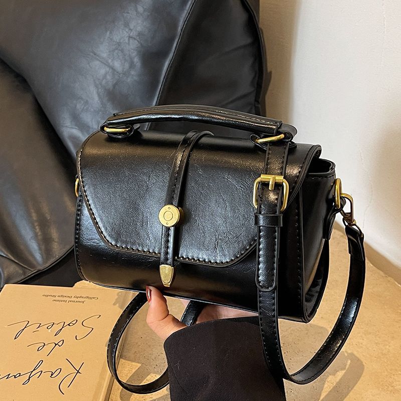 Vintage-Inspired Leather Handbag Bowlift