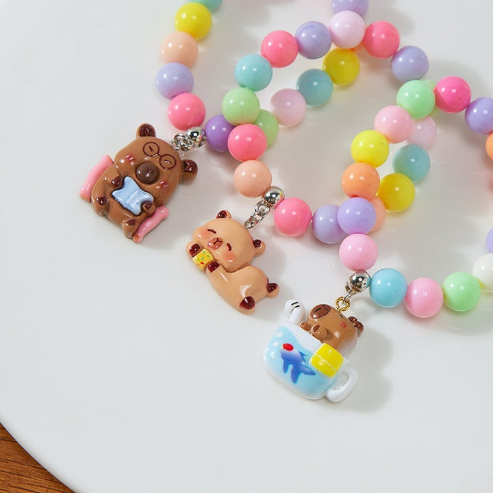 Colorful children's bracelet with crafted pendant Bowlift