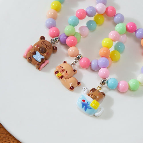 Colorful children's bracelet with crafted pendant Bowlift
