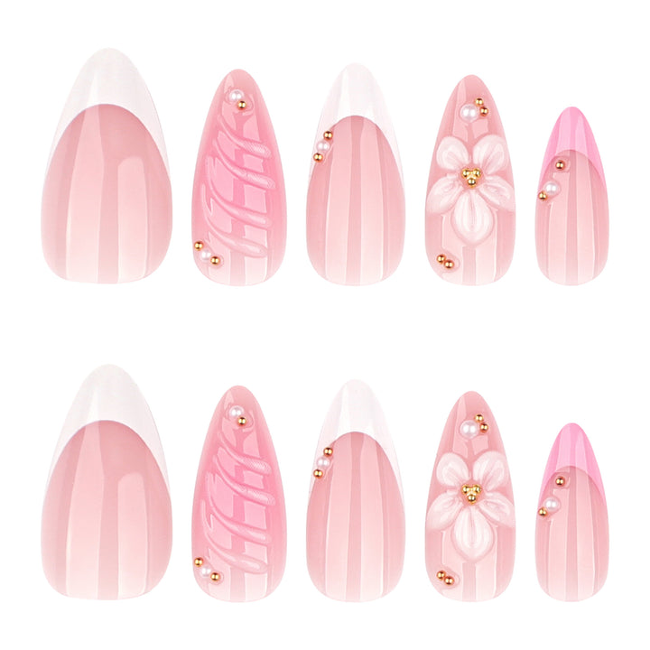 Artificial nail art with floral design and glitter accents Bowlift