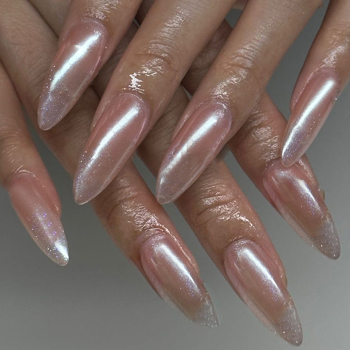 Artistic stiletto nails with glitter gradient and elegant design Bowlift
