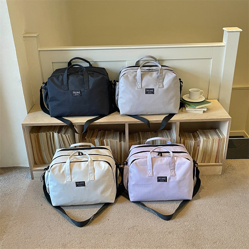 Multifunctional Travel Bag with Reinforced Carry Handle Bowlift