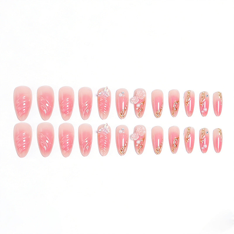 Artificial nail creation with floral 3D details and glitter accents Bowlift