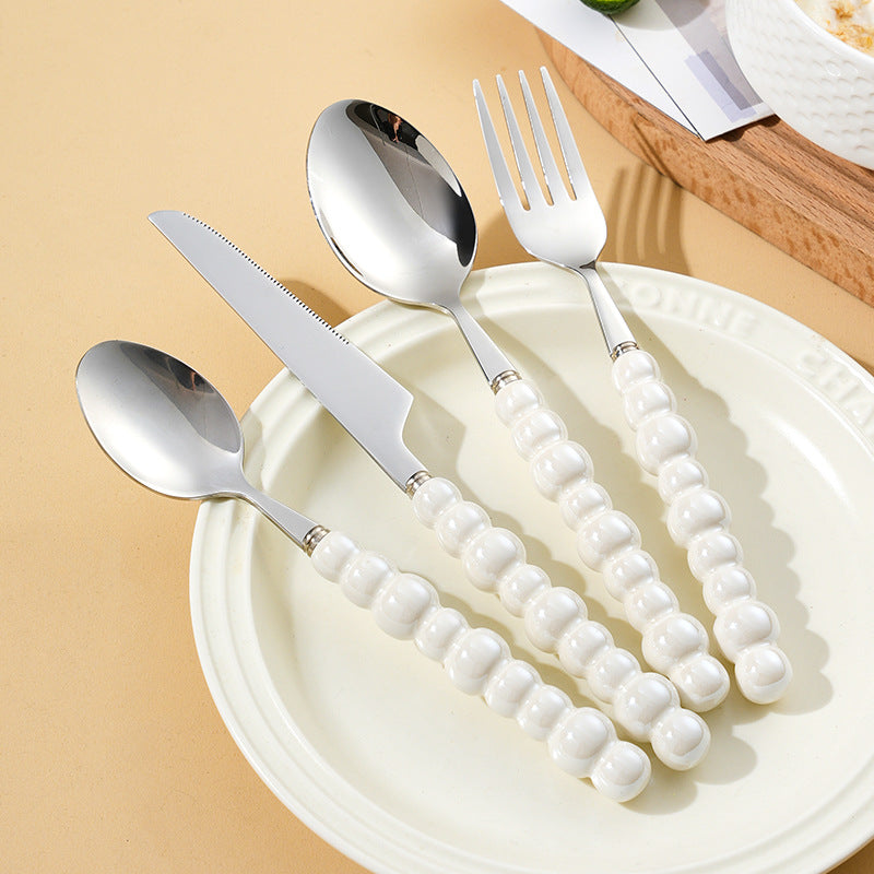 Elegant finger food fork with non-slip handle Bowlift