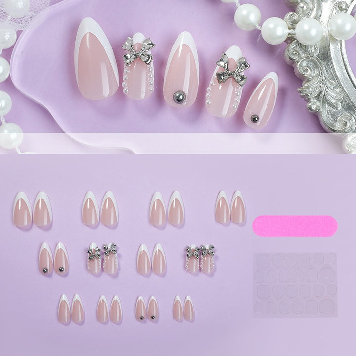 Acrylic nail set with elegant decorative embellishments Bowlift