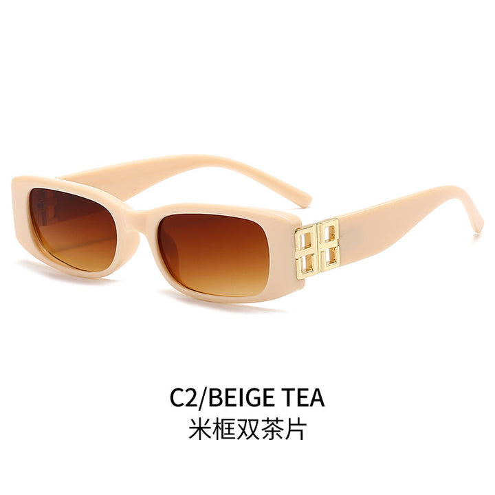 Ladies' fashionable sunglasses with luxurious gold-colored accent Bowlift
