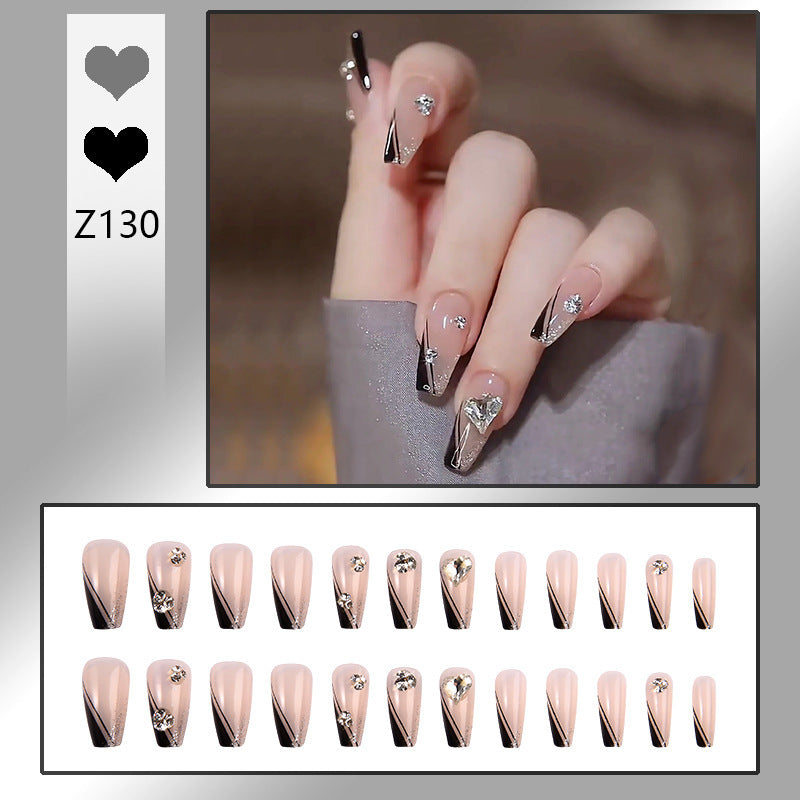 Nail art set with elegant wave patterns and delicate pearl accents Bowlift