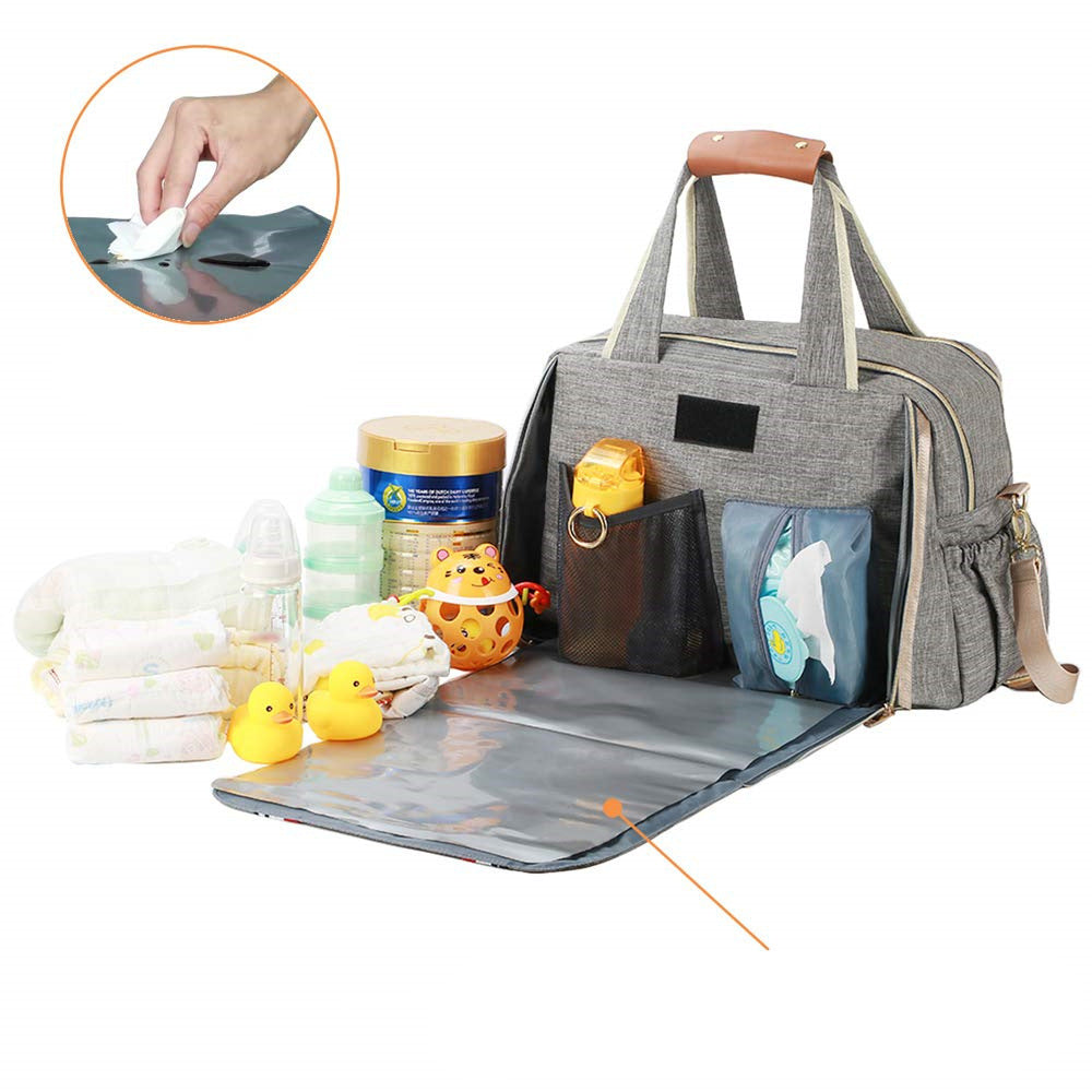 Ladies diaper bag with integrated changing mat Bowlift