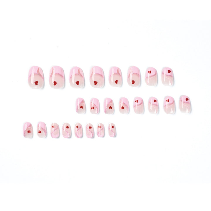 Artistic Nail Extensions with Heart Motif Bowlift