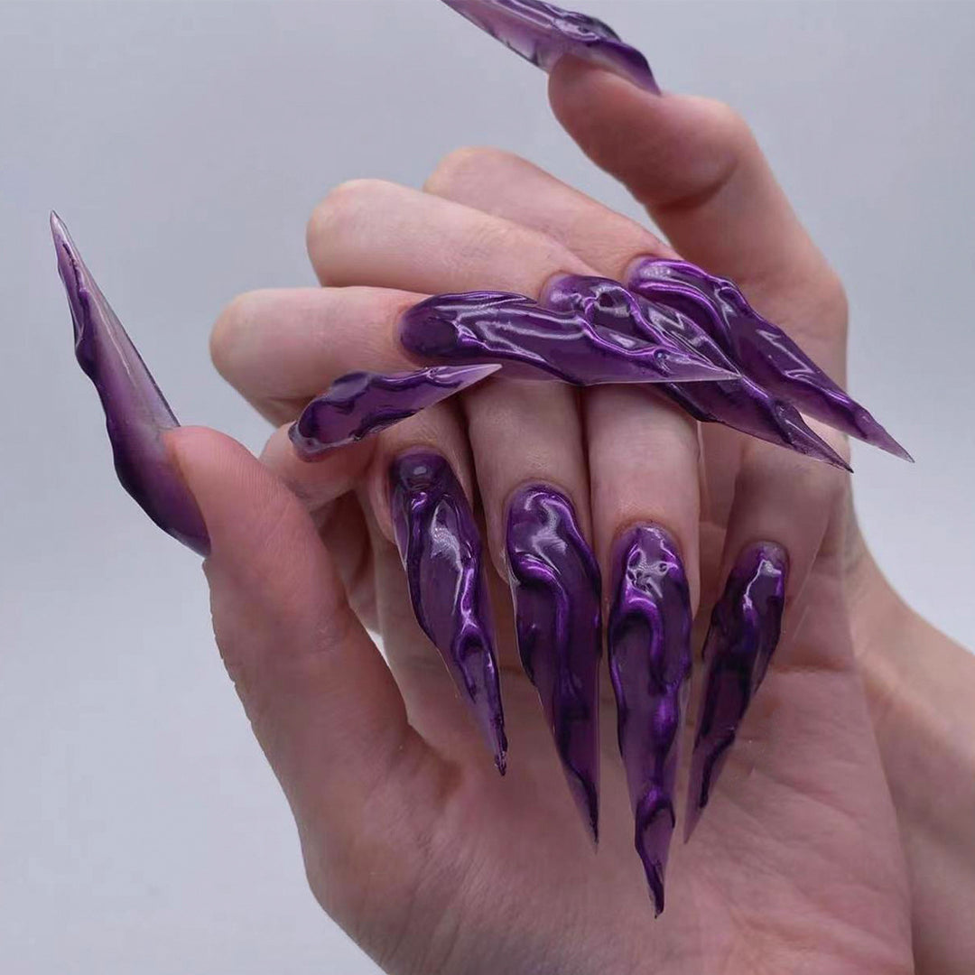 Creative Stiletto Nail Art with Blood Red Accents Bowlift
