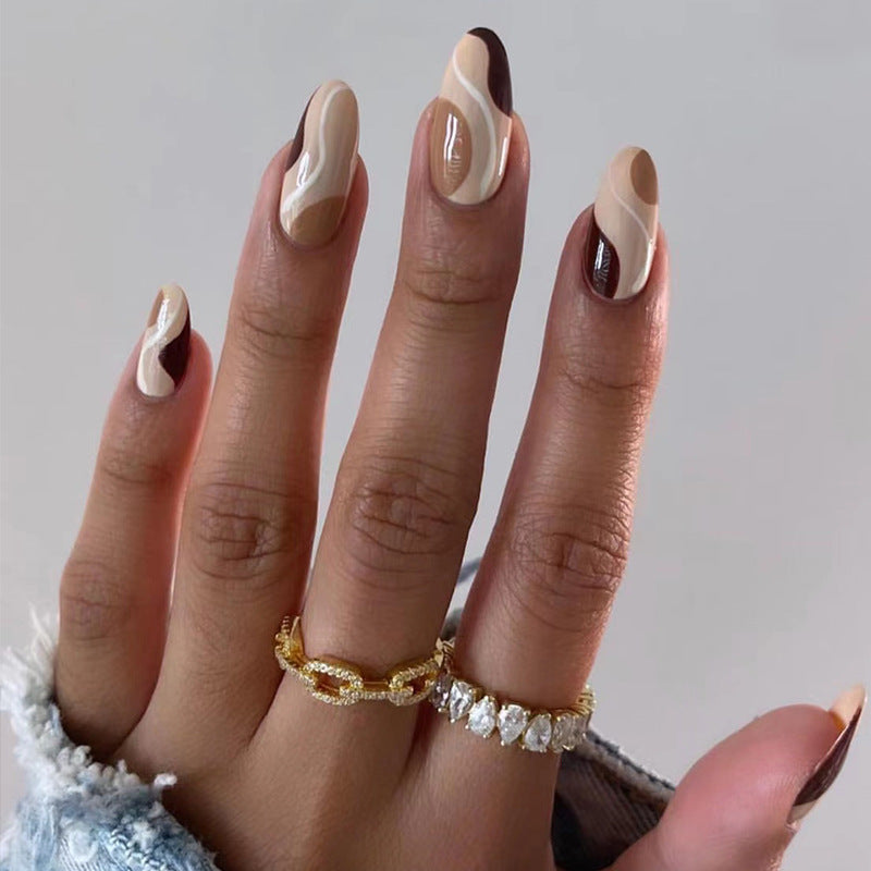 Artificial nail extensions in elegant wave design Bowlift