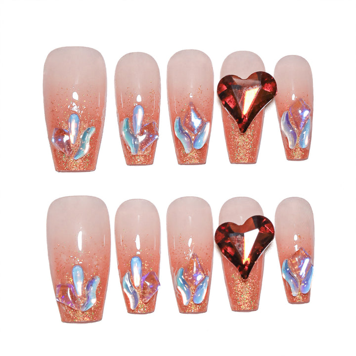 Artistic acrylic nails with heart design and sparkling accents Bowlift