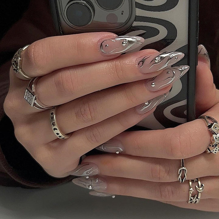 Nail set with elegant water drop design and 3D accents Bowlift