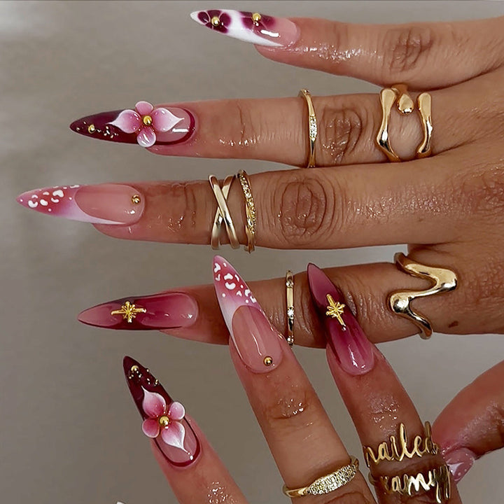 Artifical nail set with delicate floral design and glamorous accents Bowlift