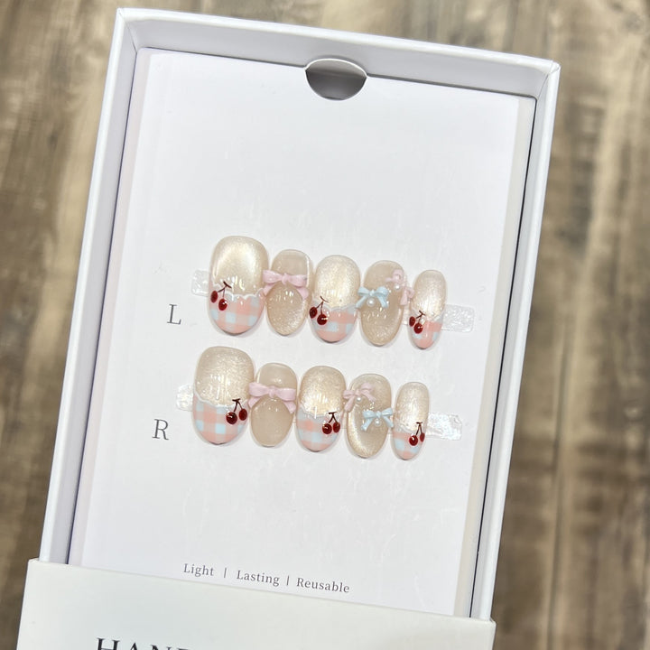 Decorative Press-On Nail Art Set with Charming Bow and Cherry Accents Bowlift