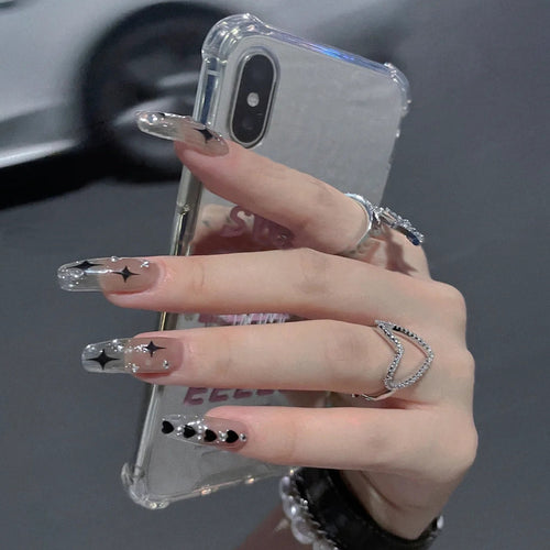 Trendy artificial nails with star design Bowlift