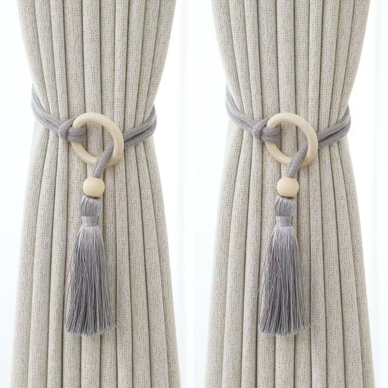Elegant curtain tieback with tassels Bowlift