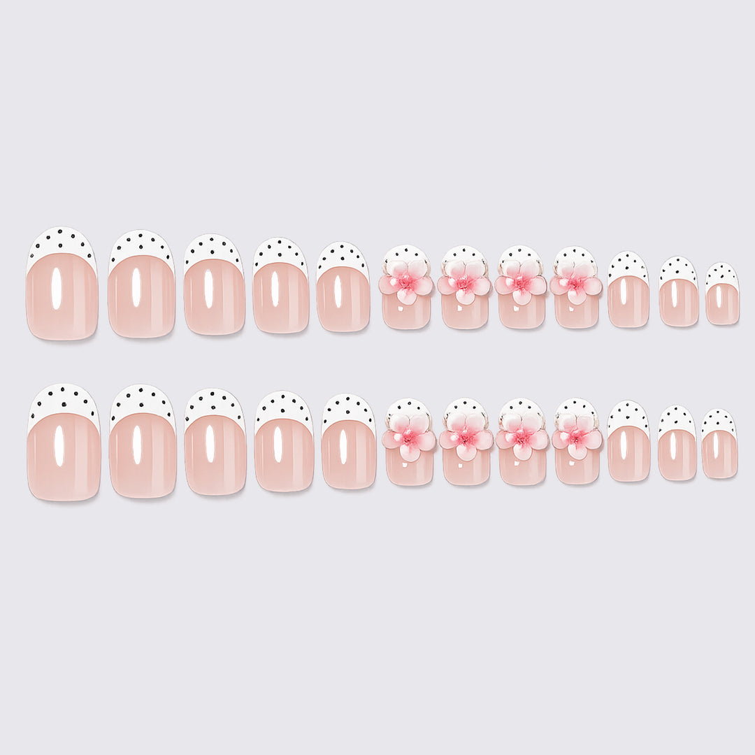 Artificial nail set with delicate floral designs and elegant accents Bowlift